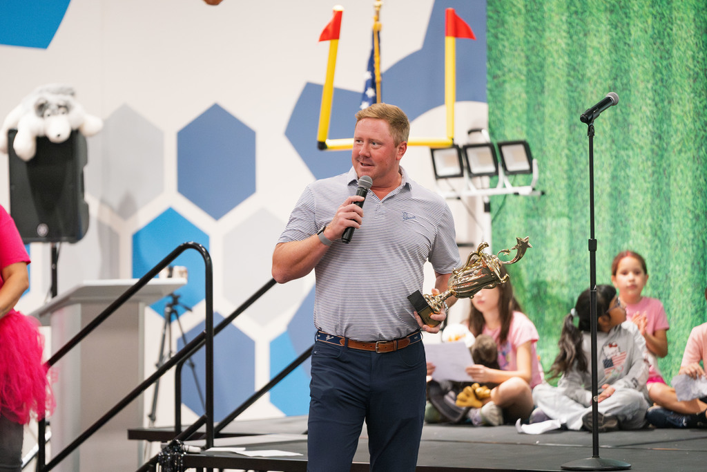 brandon weeden talking at an assembly