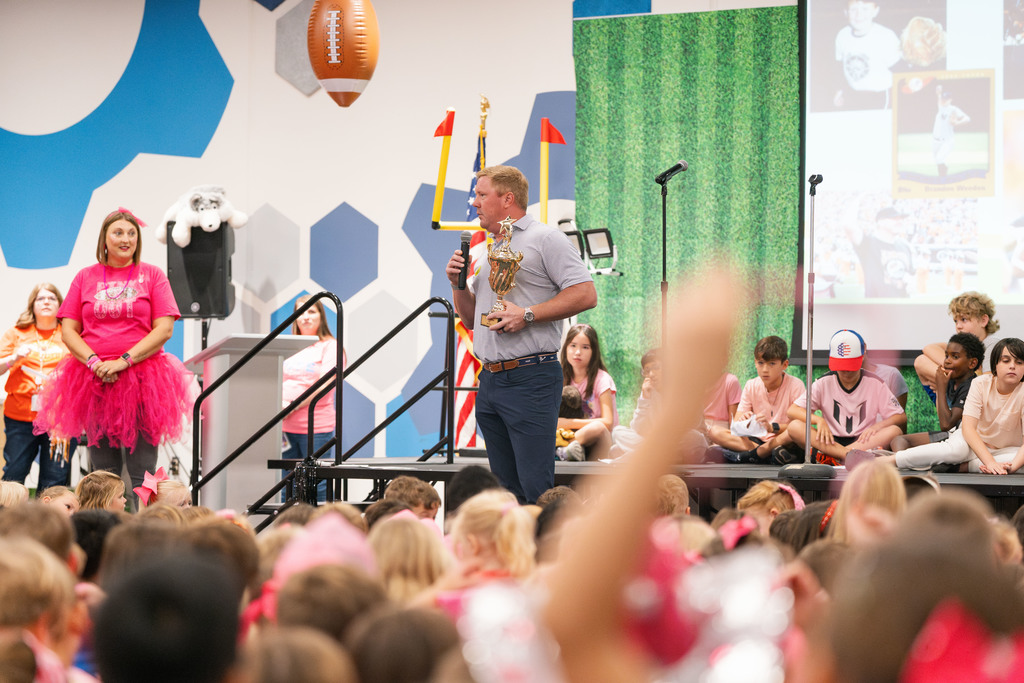 brandon weeden talking at an assembly