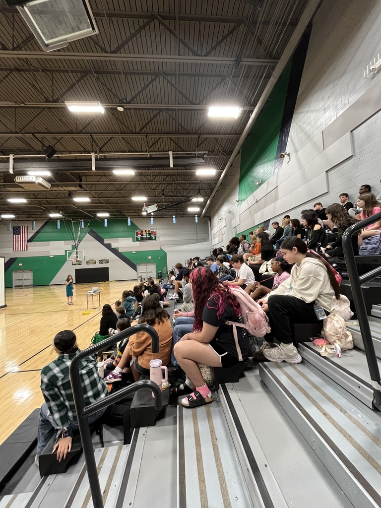 students listening to guest speaker
