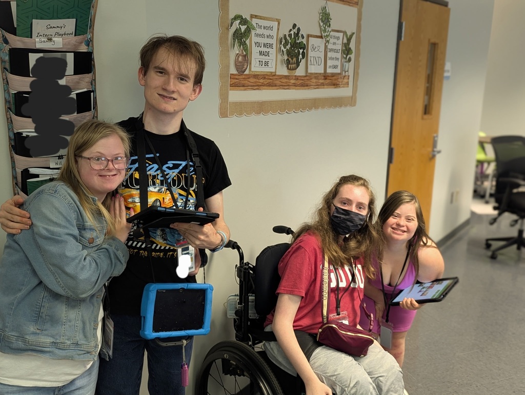 Four Waiters smiling