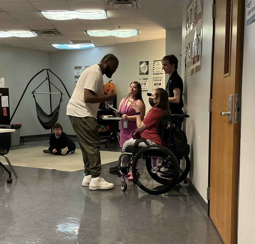A group of interns and staff getting ready to work