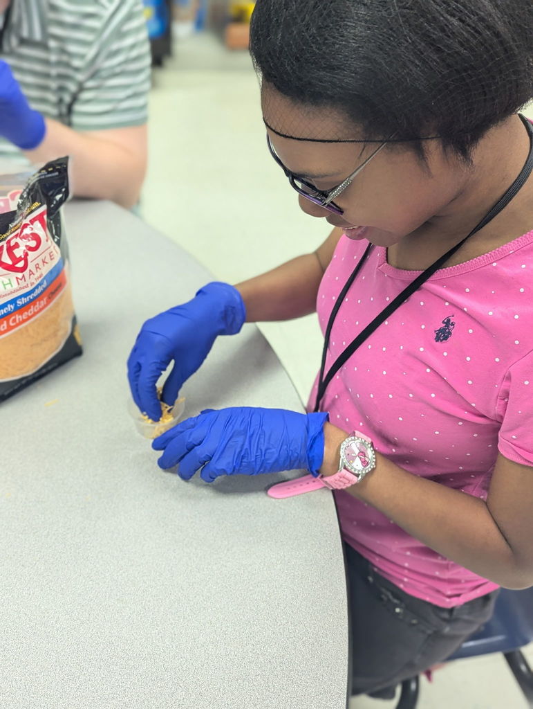 An intern preparing individual side orders