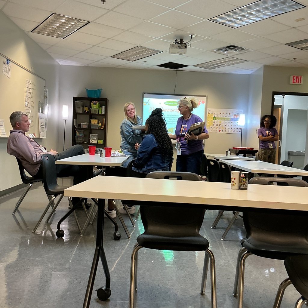 An intern/waitress taking a customers order