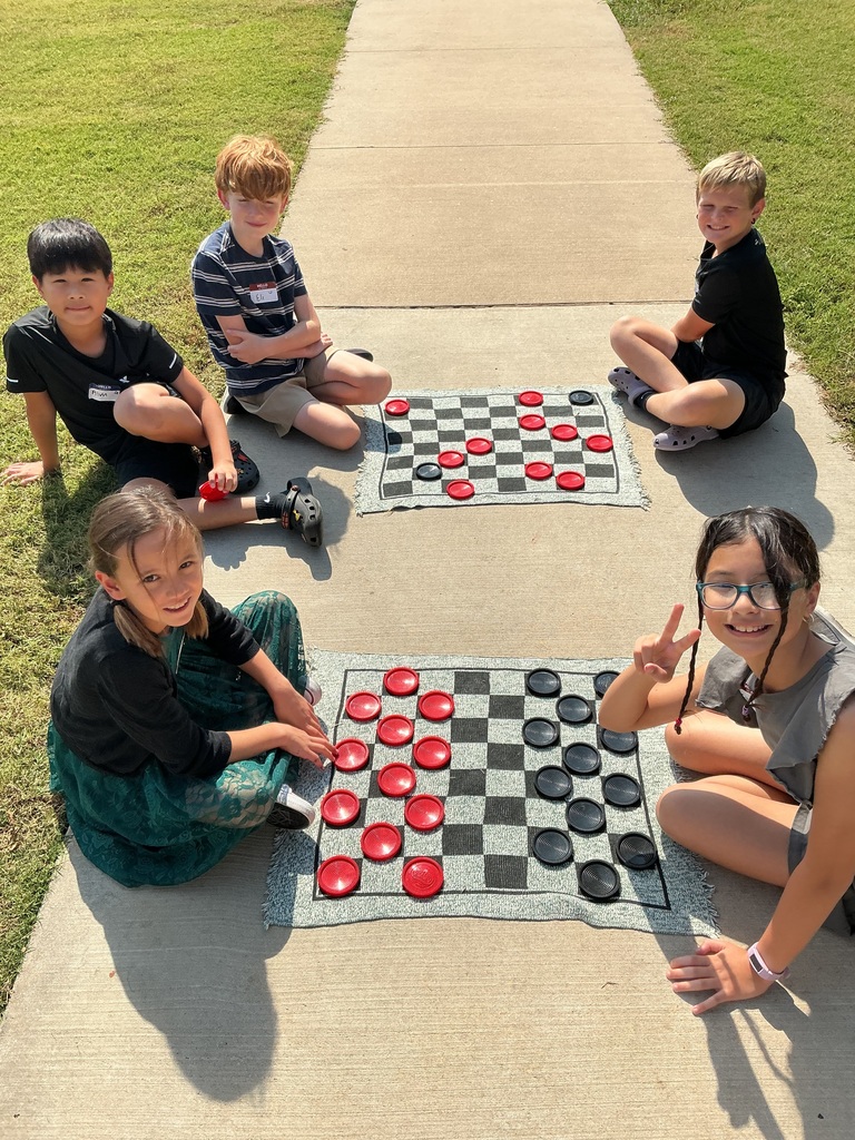 Students playing colonial game outside