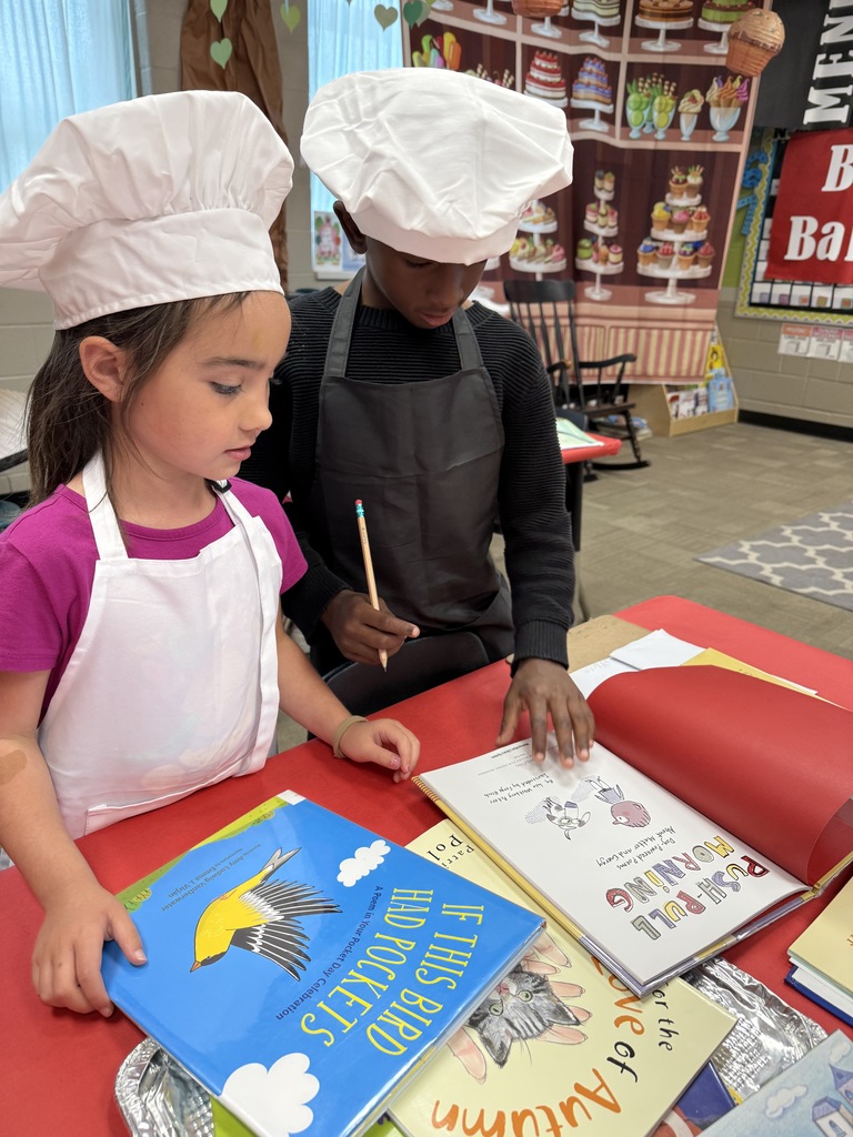Two students reading together