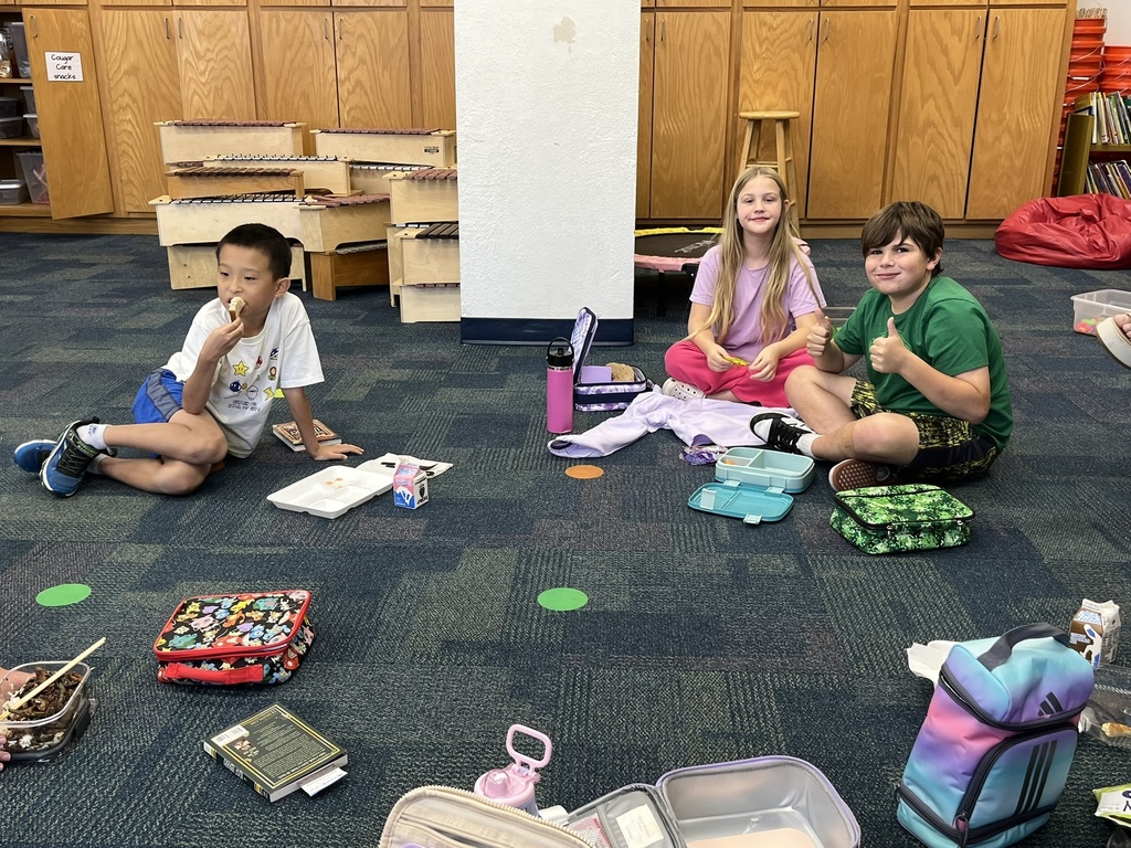 Fourth graders discussing a book