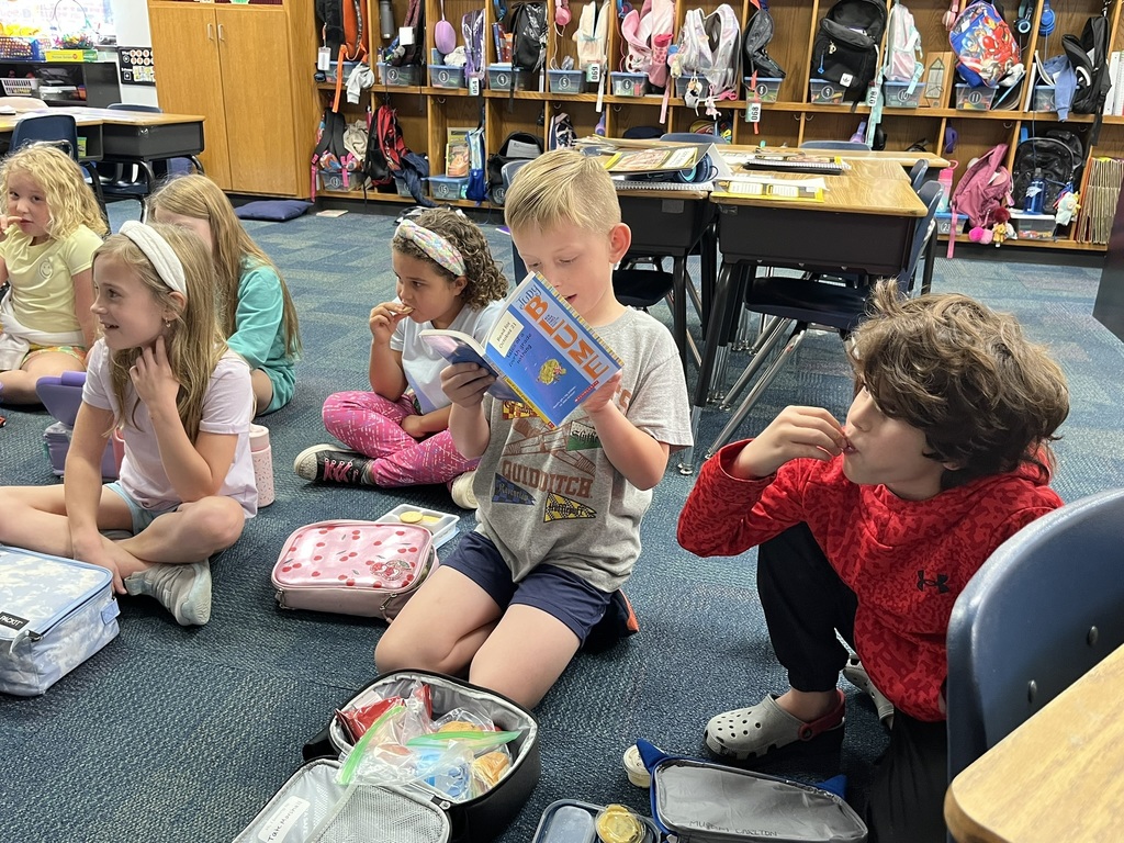 Third graders discussing a book