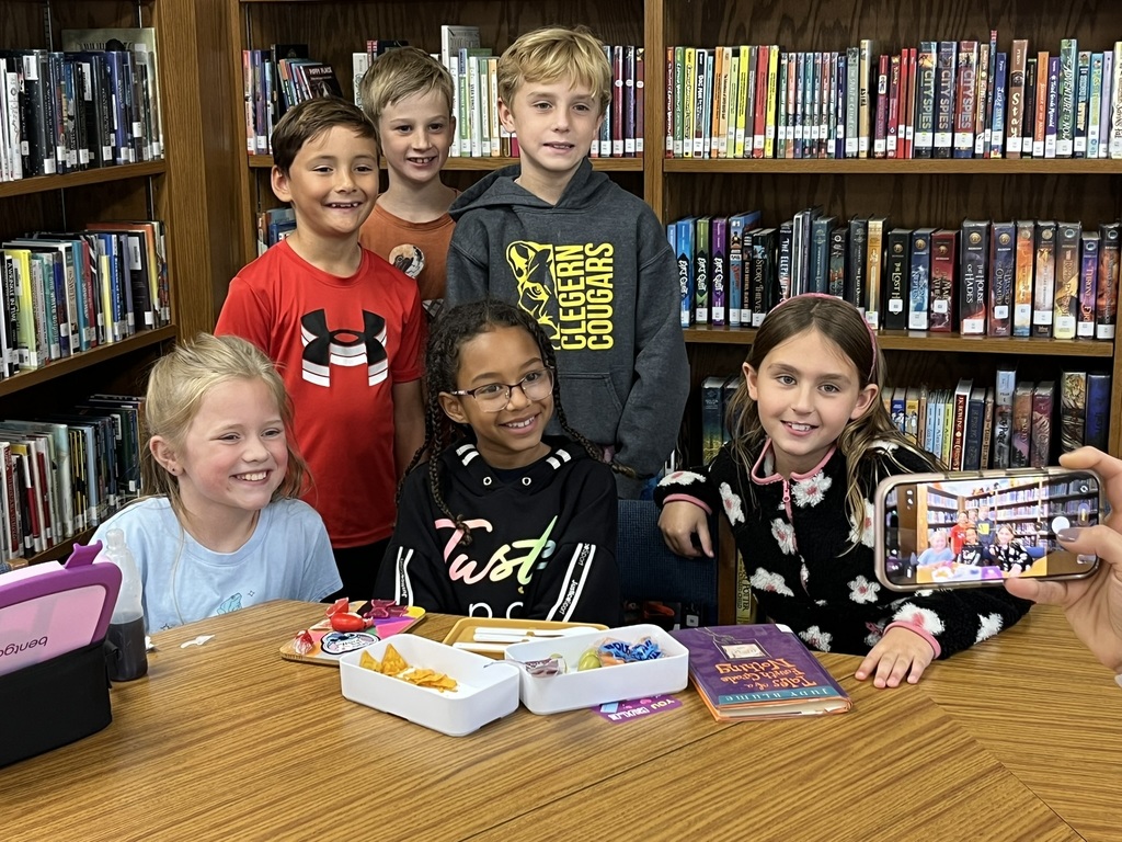 Third graders discussing a book