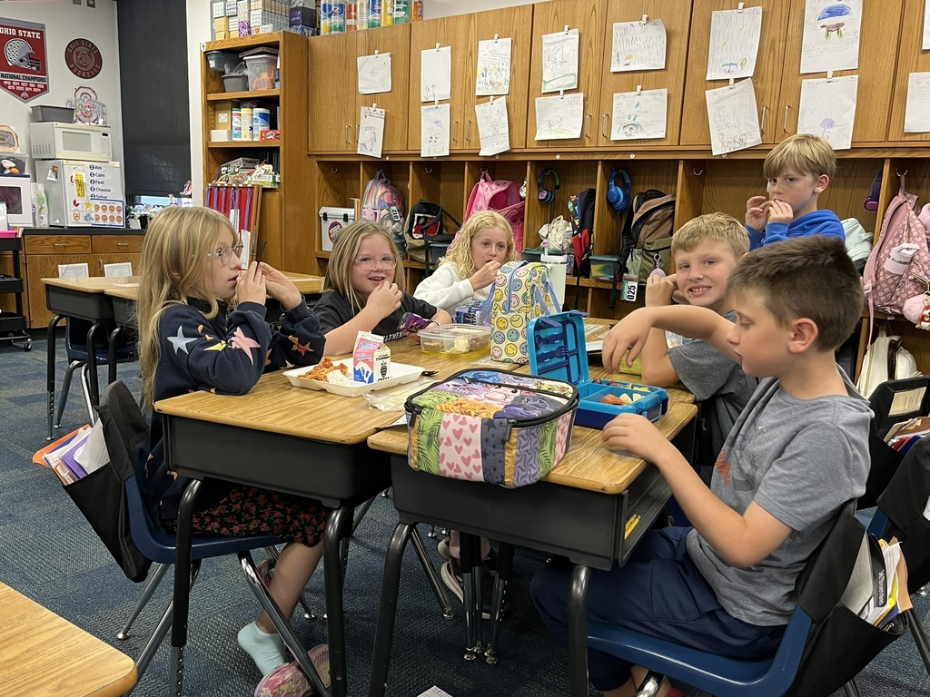 Third graders discussing a book