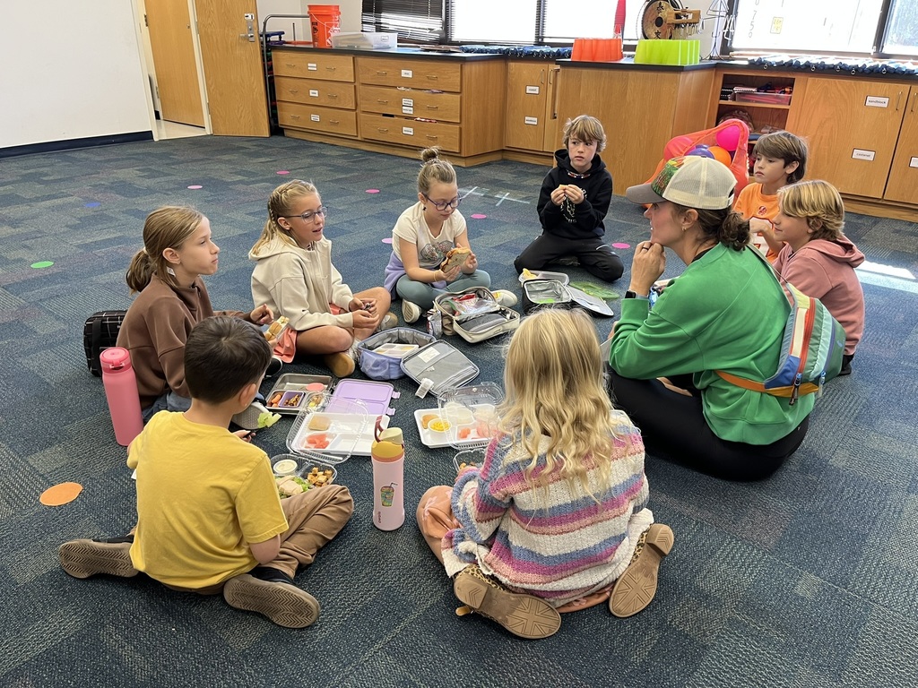 Third graders discussing a book