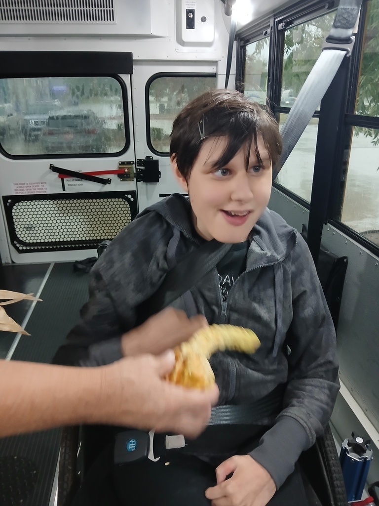 An intern feeling the bumpy gourd.