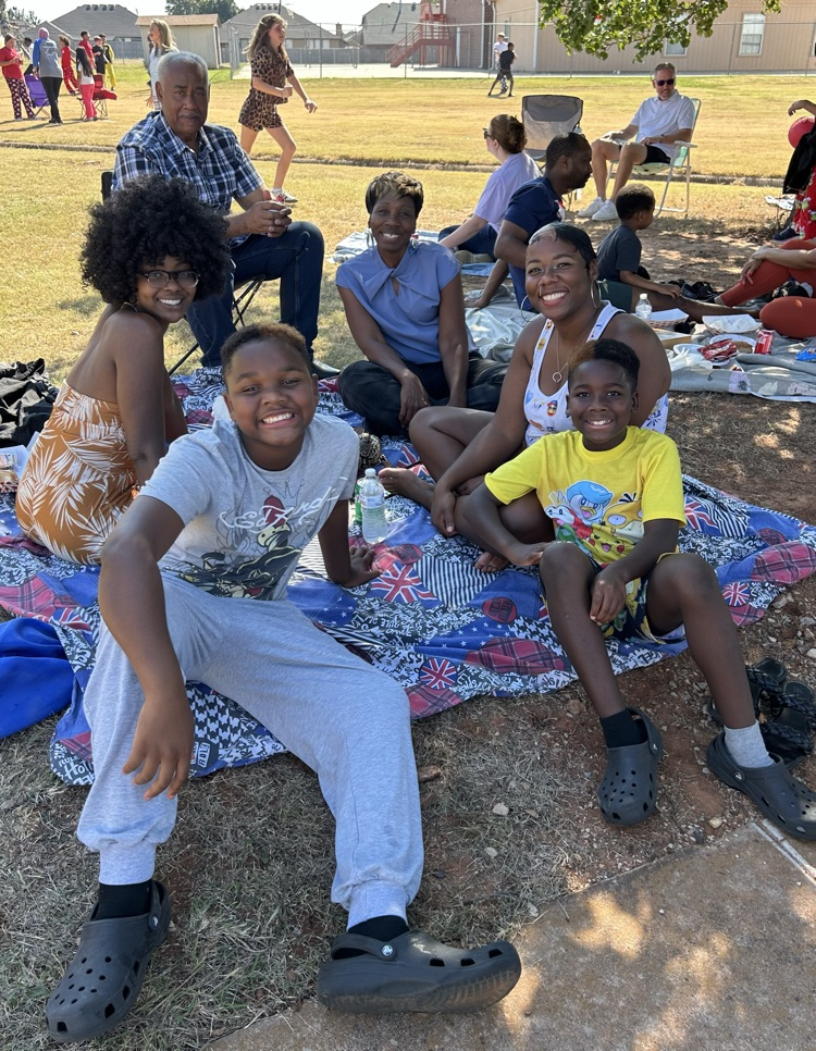 family picnicking at cookout 