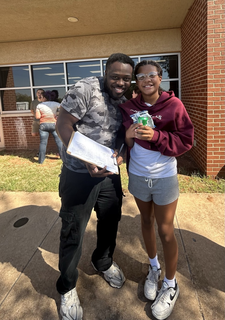 student and parent at cookout 