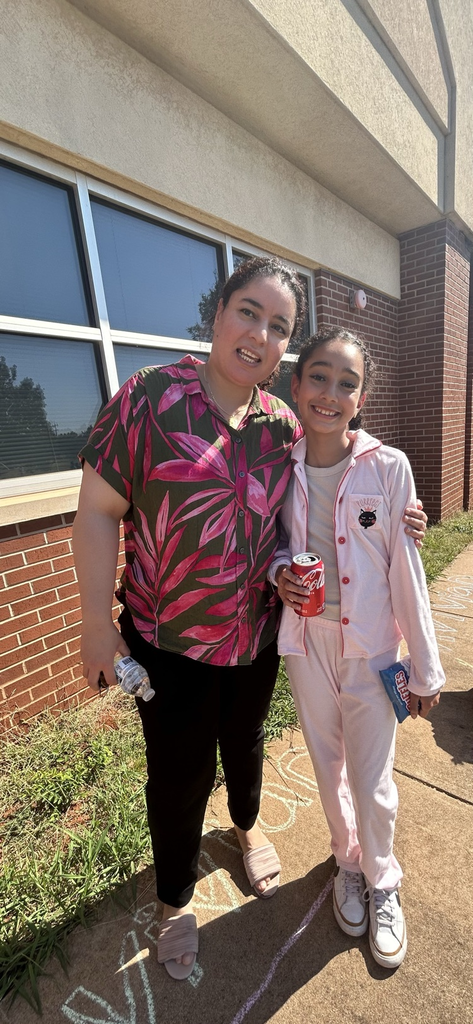 student and parent at cookout 