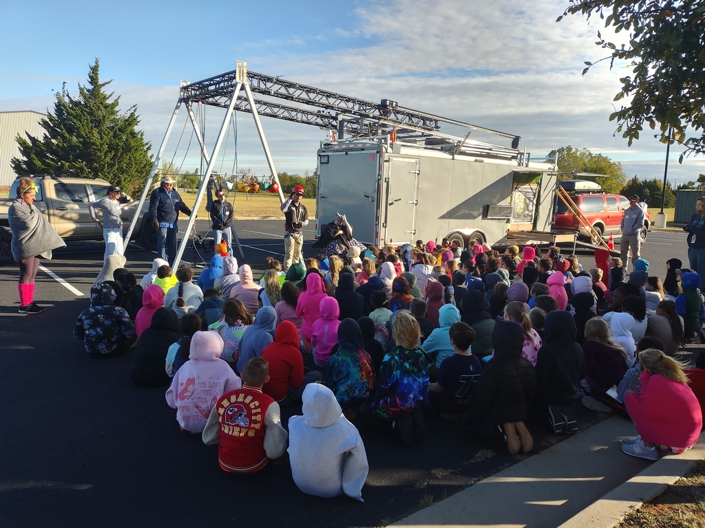 student seated listening to presentation
