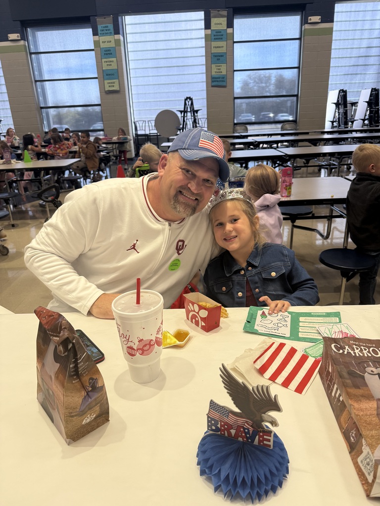 child smiling with her veteran