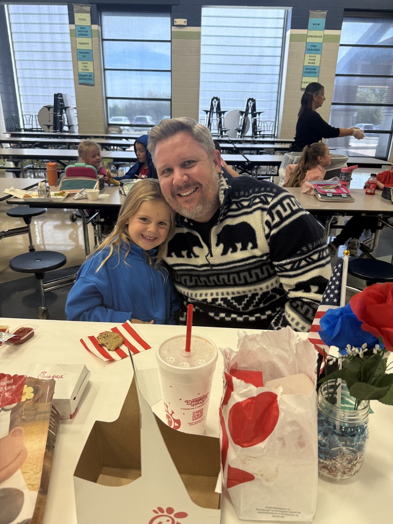 child smiling with her veteran