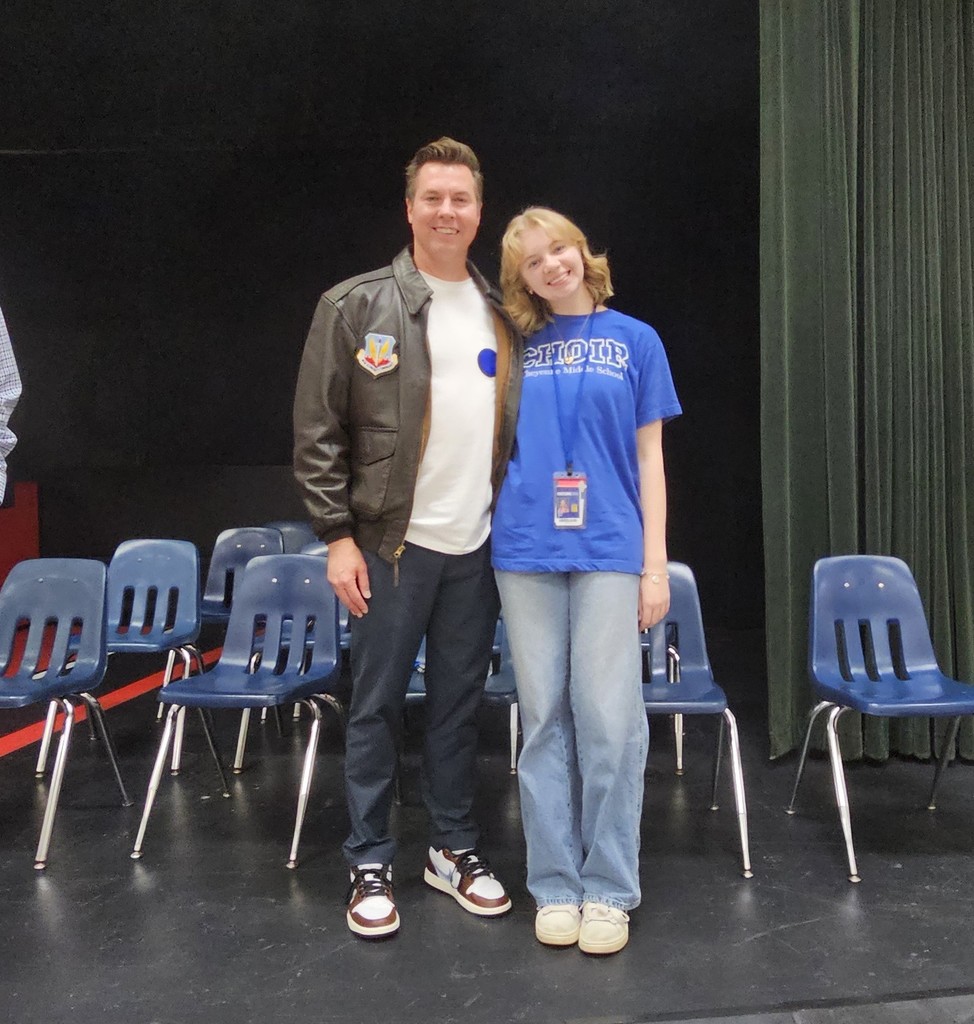 Senator Pugh and his daughter posing for a picture