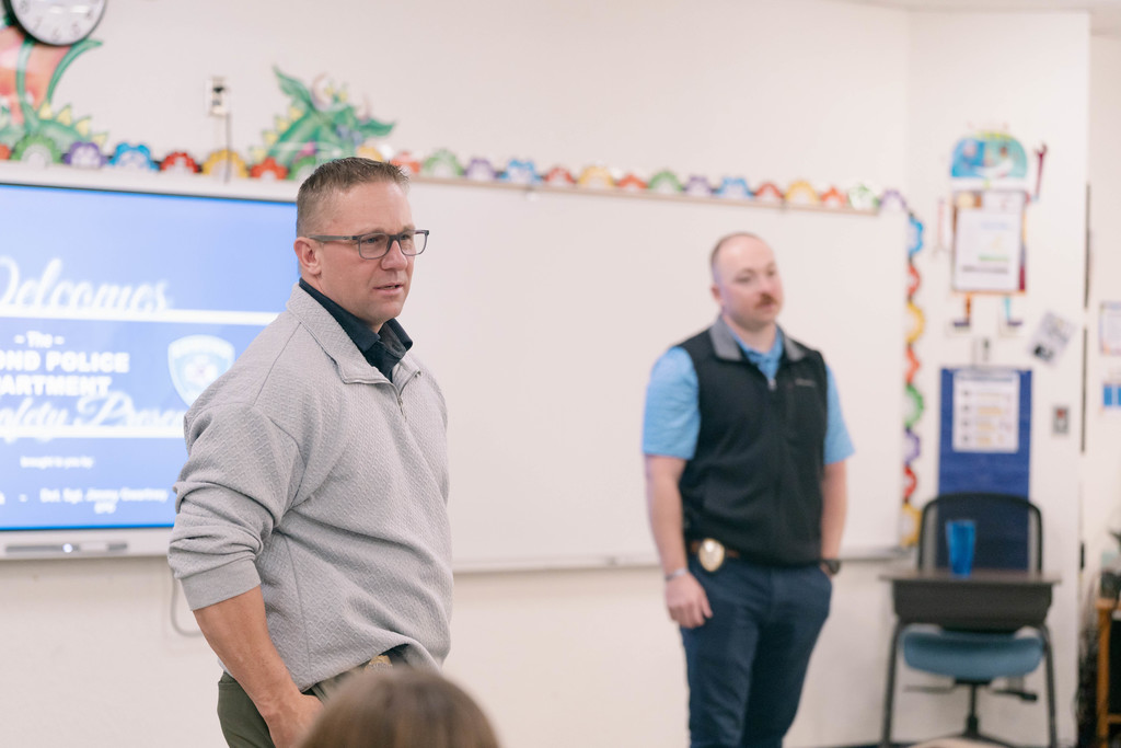 police officer talking to class