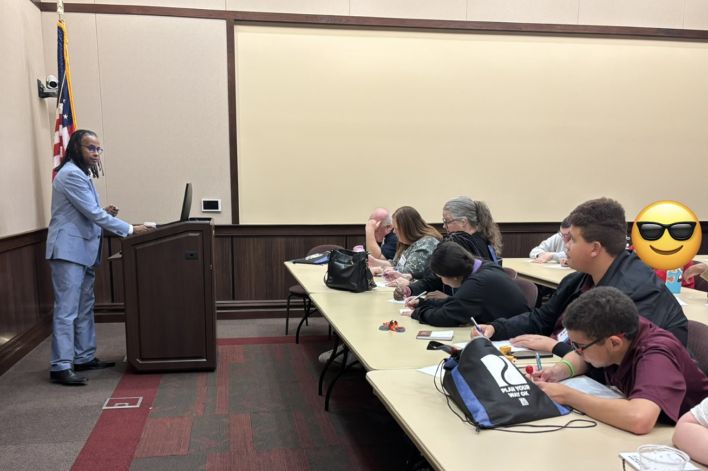 Project SEARCH interns listening to a speaker