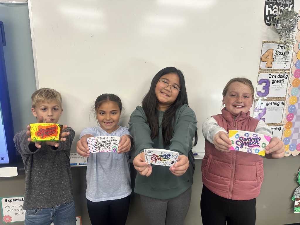 students holding colorful coffee sleeves