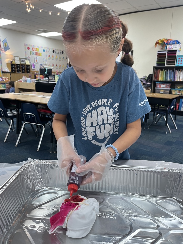 1st grade celebrating 60's day with tie die and dancing