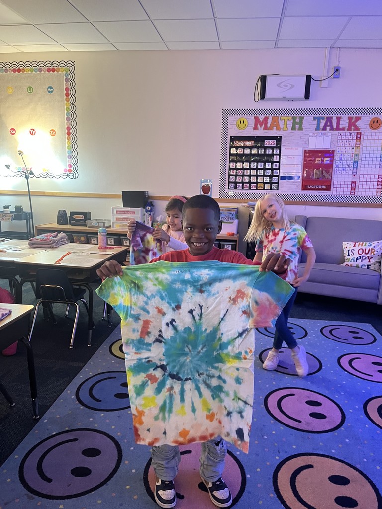 1st grade celebrating 60's day with tie die and dancing