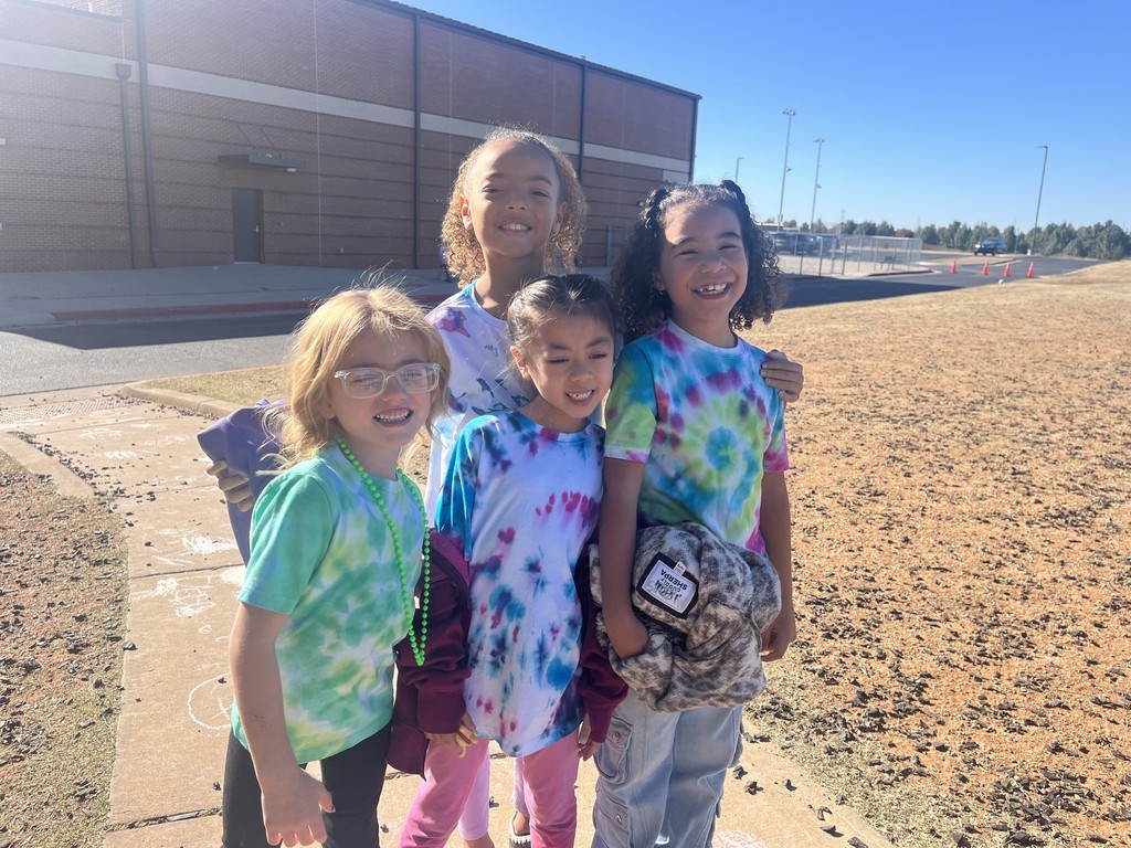 1st grade celebrating 60's day with tie die and dancing