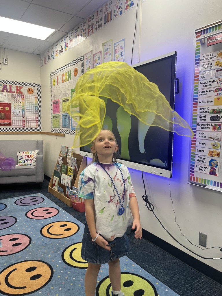 1st grade celebrating 60's day with tie die and dancing