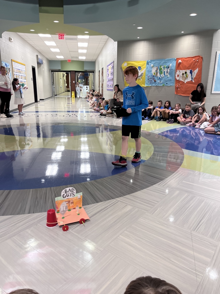 Boy with a homemade mini float 