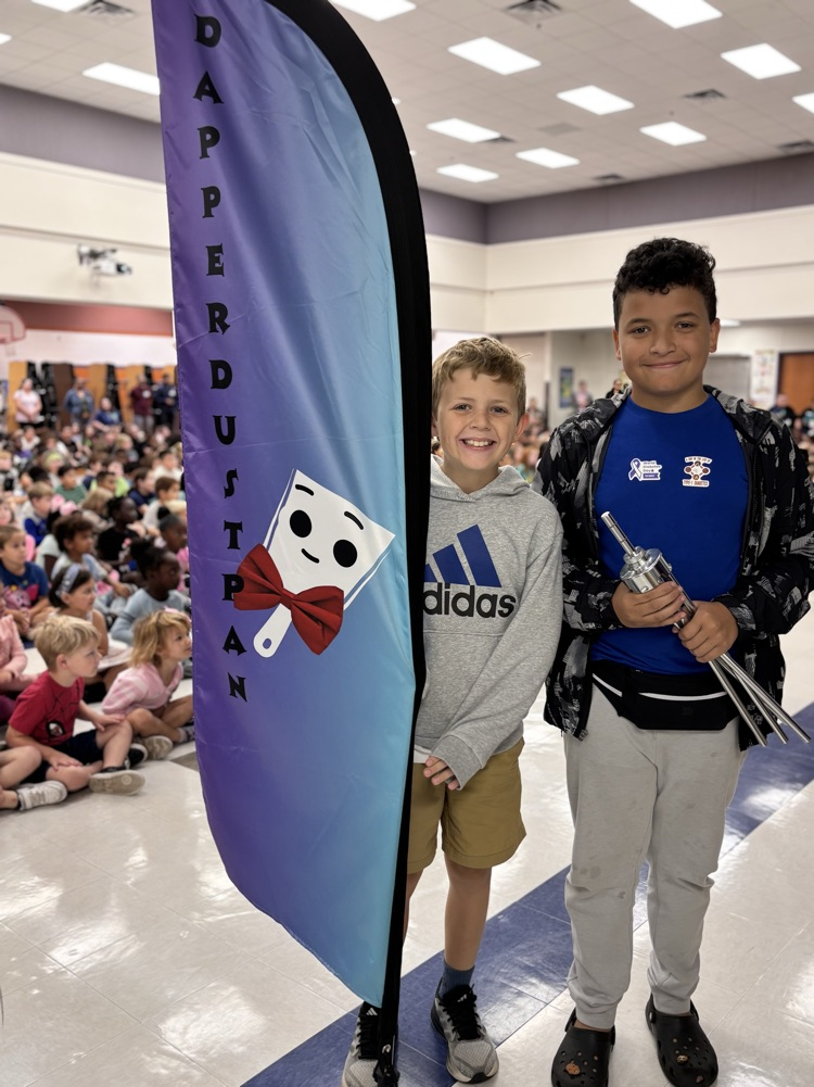 students with dapper dustpan flag 