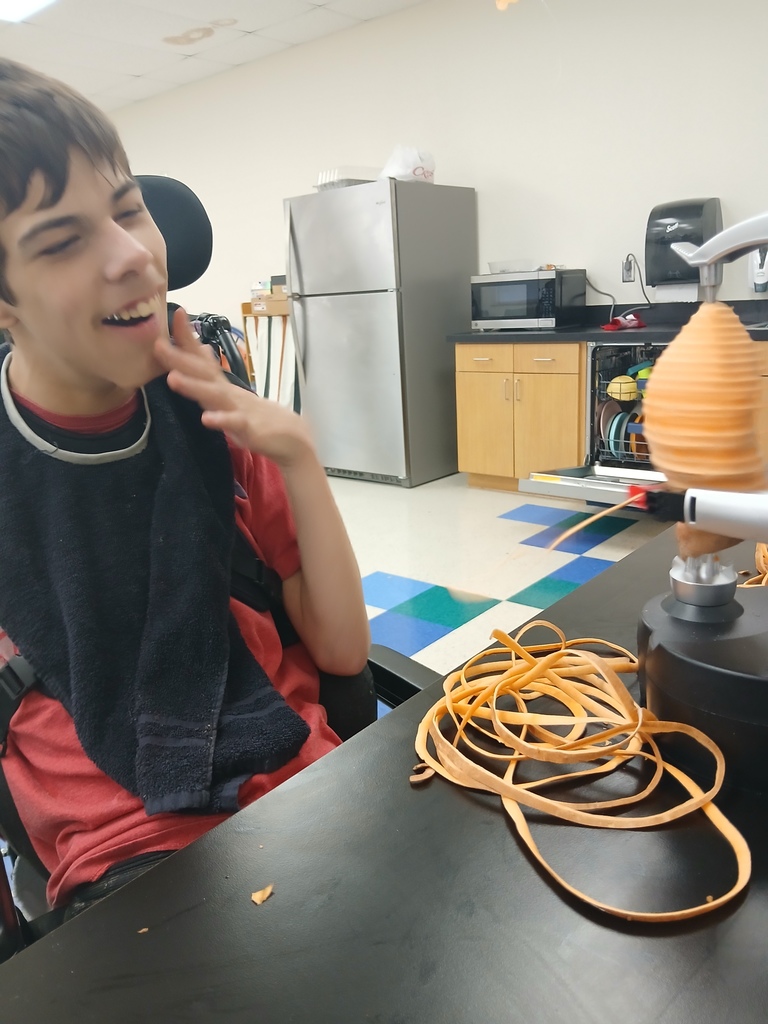intern peeling potatoes