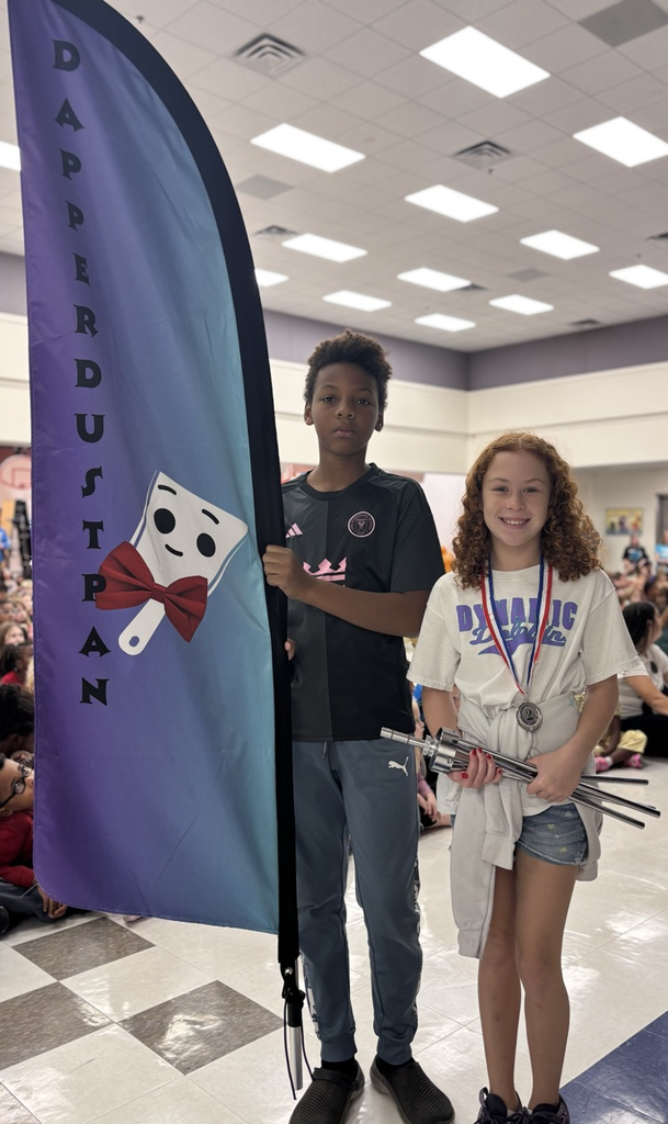 students with dapper dustpan flag 