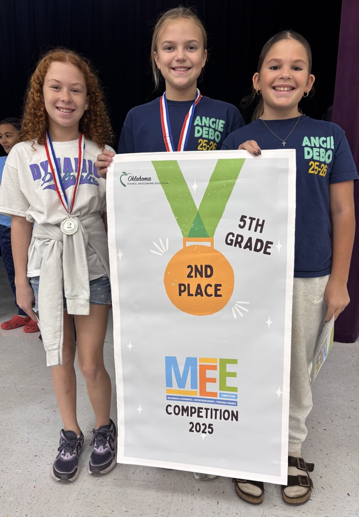 students with second place banner for mee competition 