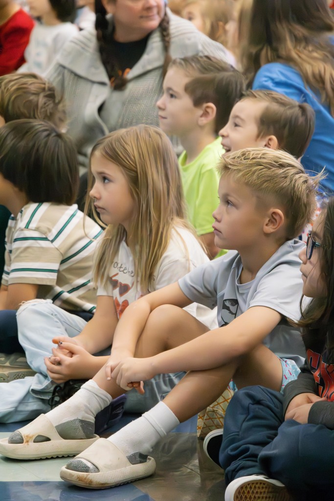 students listening to a speaker