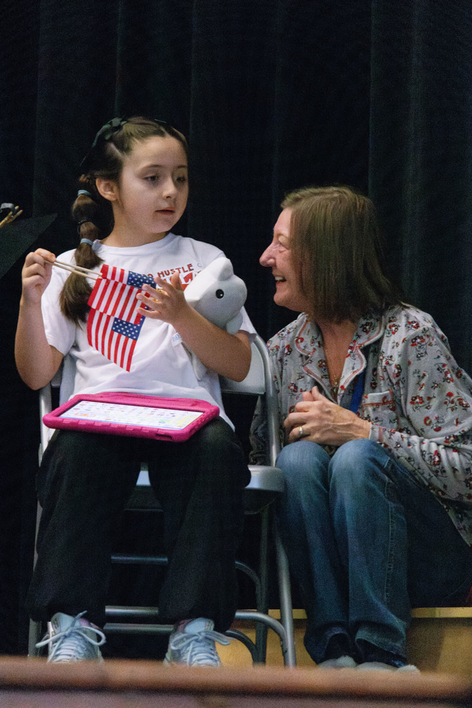 teacher smiling at a student
