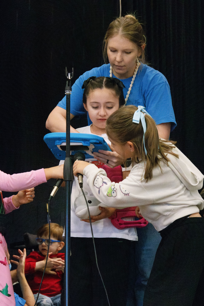 student helping another student speak