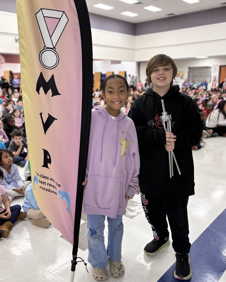 students with award flag 