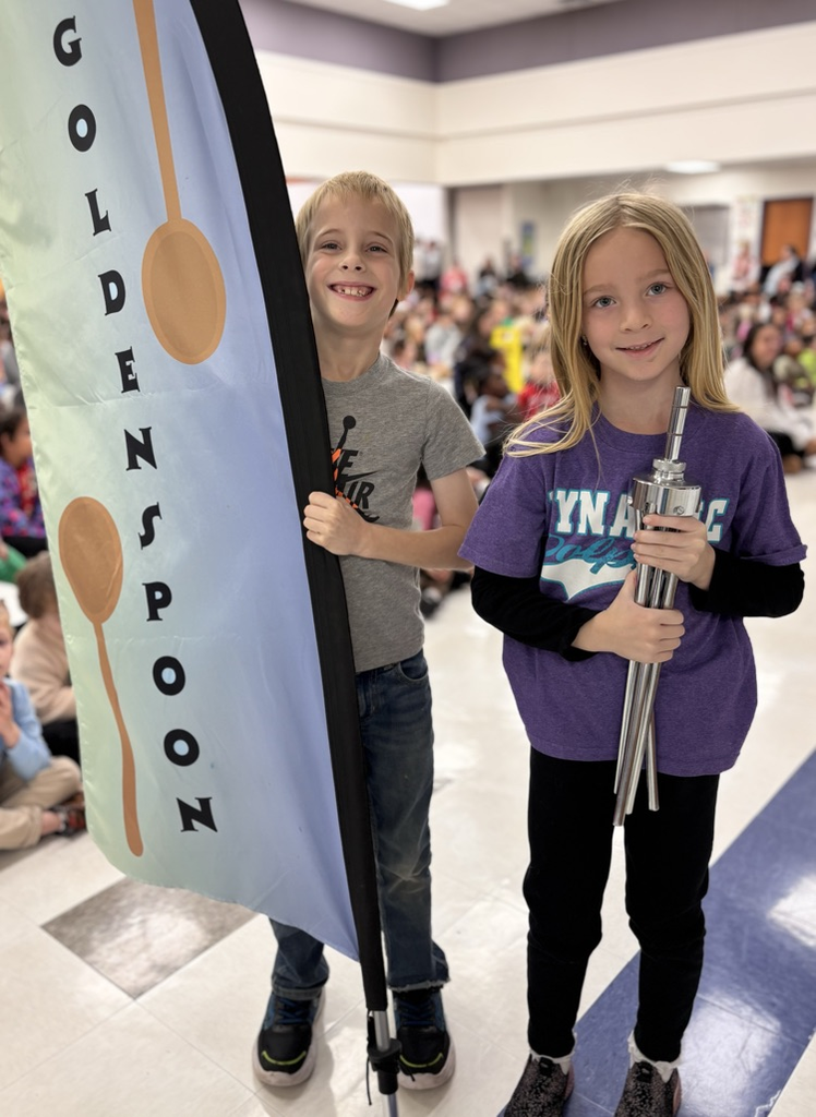 students with award flag 