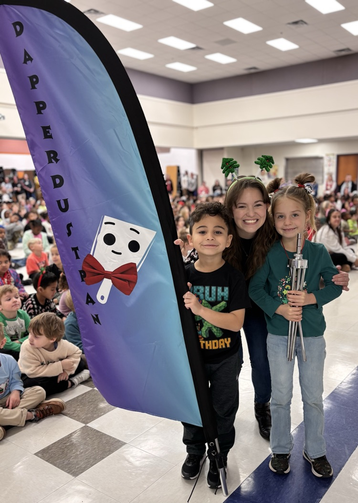 students with award flag 
