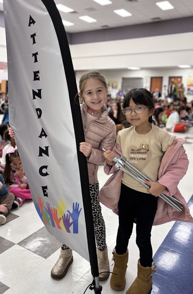 students with award flag 