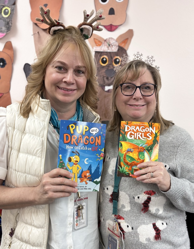 Mrs Krist and Mrs masters with books 