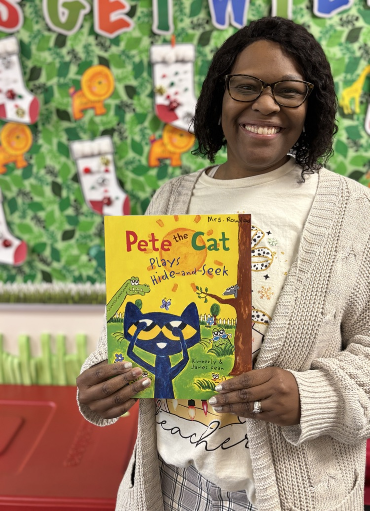 Mrs Rowland with book 