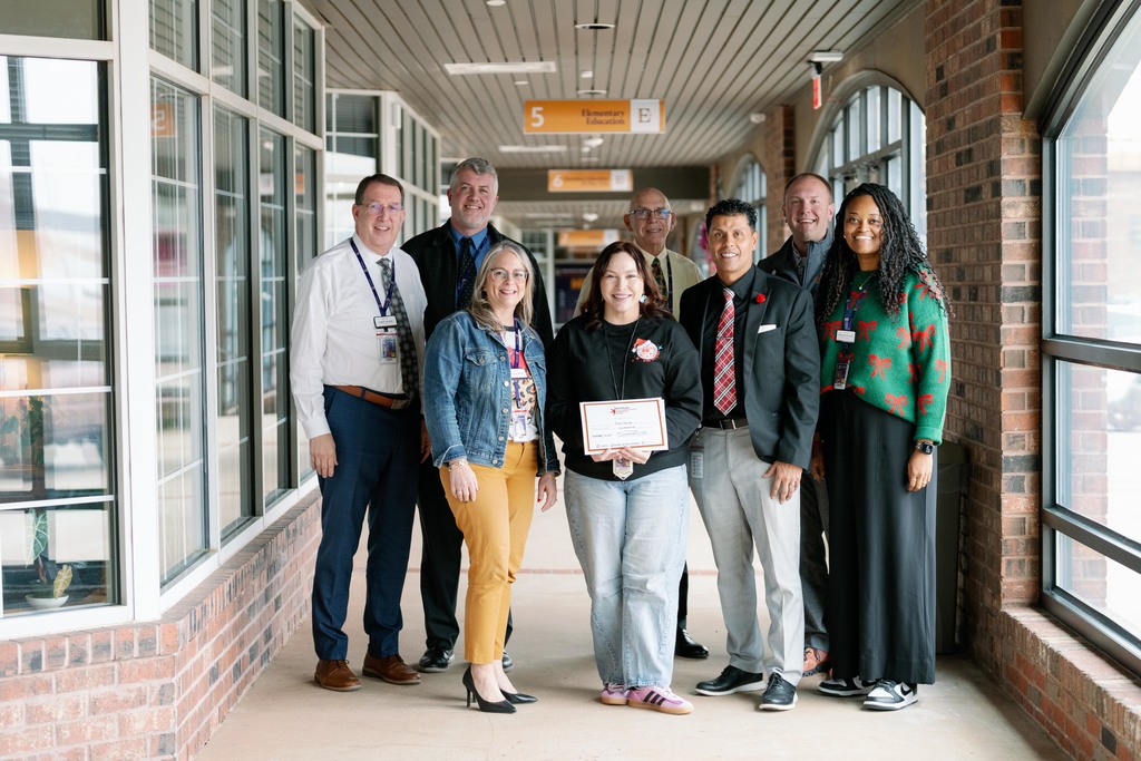 award recipients posing with their award