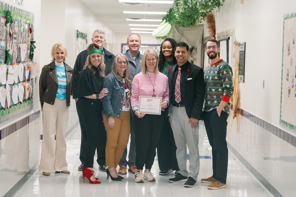 award recipients posing with their award
