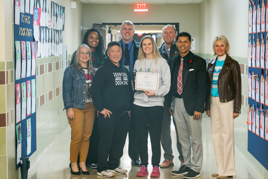 award recipients posing with their award
