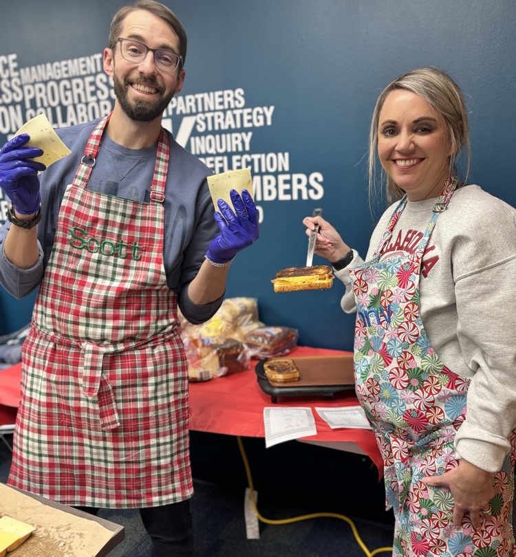 Mrs Williams and Mr Goodrich making grilled cheeses 