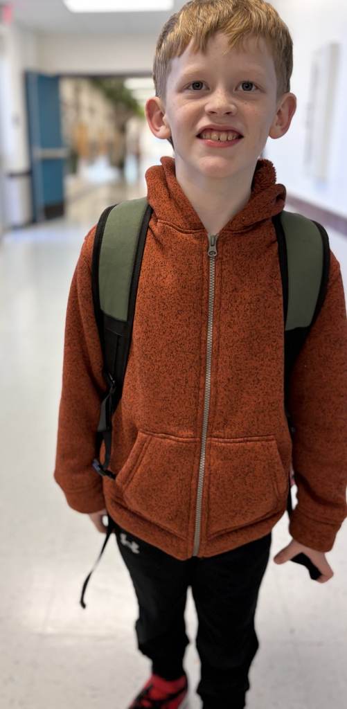 student smiling at camera 