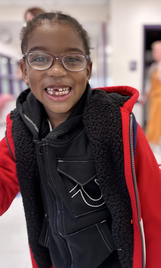 student smiling at camera 