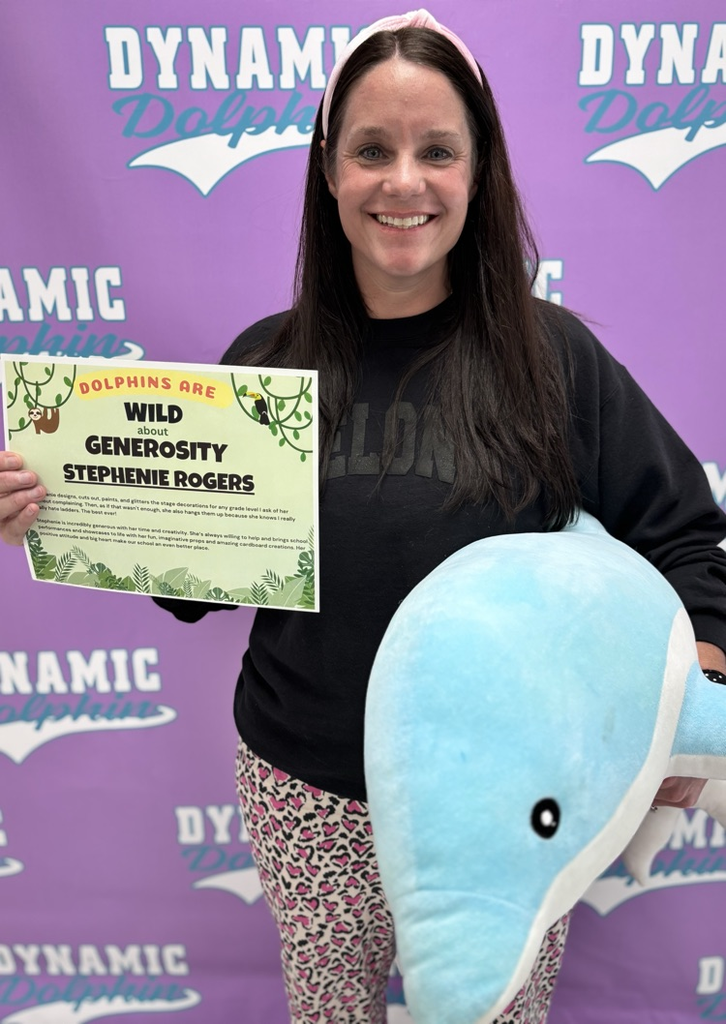 ms. rogers with her award 